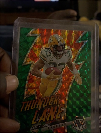 2023 Panini Mosaic #TL-AJ Aaron Jones Thunder Lane Green Mosaic Prizm — front