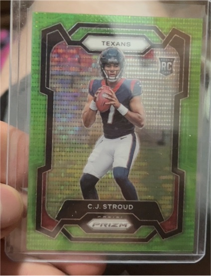 2023 Panini Prizm #339 C.J. Stroud Neon Green Pulsar Prizm Rookie Card — front