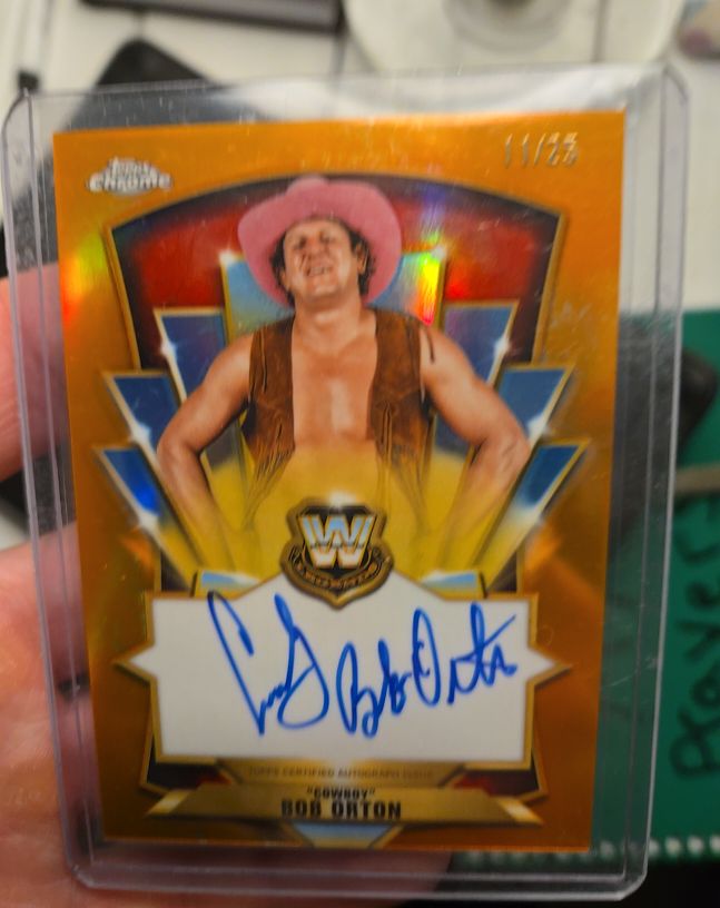 2025 Topps Chrome WWE Cowboy Bob Orton 1985 Legends Orange Refractor #85TL-BO — front