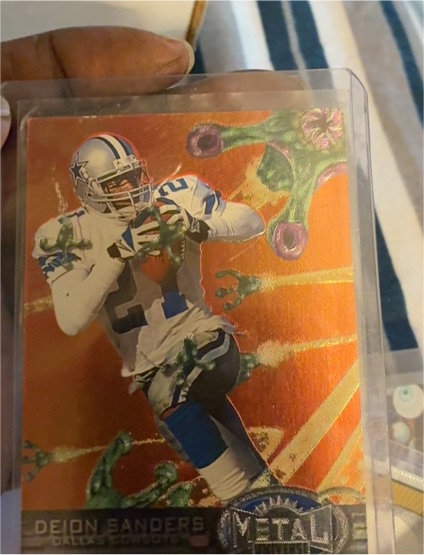 1997 Skybox Metal Universe #135 Deion Sanders — front