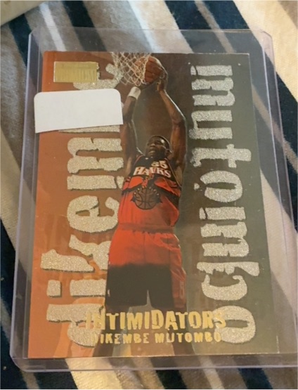 1996-97 SkyBox Premium #14 Dikembe Mutombo Intimidators — front