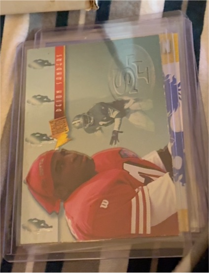 1995 Fleer Metal Platinum Portraits #9 Deion Sanders — front