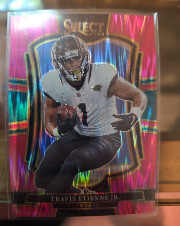 2025 Panini Select Premier Level #130 Travis Etienne Jr. — front