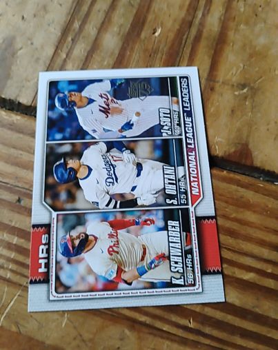 2026 Topps Series 1 #84 National League Leaders HR Kyle Schwarber / Shohei Ohtani / Juan Soto — front