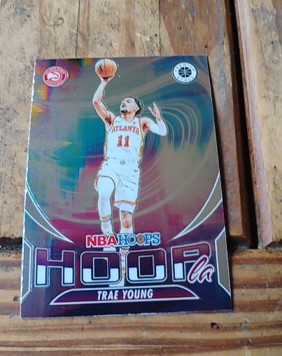 2023-24 Panini NBA Hoops Premium Stock Hoopla #15 Trae Young — front