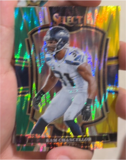 2025 Panini Select #149 Kam Chancellor Premier Level Green & Yellow Shock Prizm — front