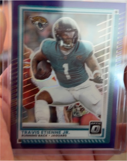 2025 Panini Donruss Optic #106 Travis Etienne Jr. — front