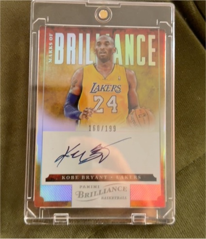 2012-13 Panini Brilliance #12 Marks Of Brilliance Kobe Bryant — front