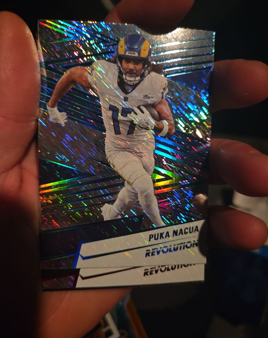 2025 Panini Revolution #25 Puka Nacua — front