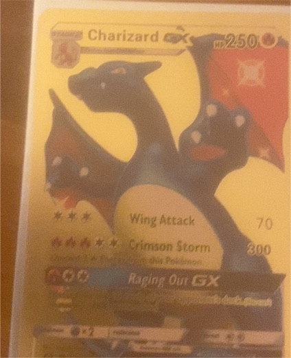 2017 Pokémon Hidden Fates #SV49 Charizard GX — front