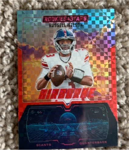 2025 Panini Rookies & Stars #4 Russell Wilson Airborne Red Plaid Prizm — front