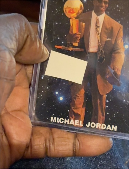 1990-91 SkyBox #334 Michael Jordan Brings Home The Trophy NBA Finals — front