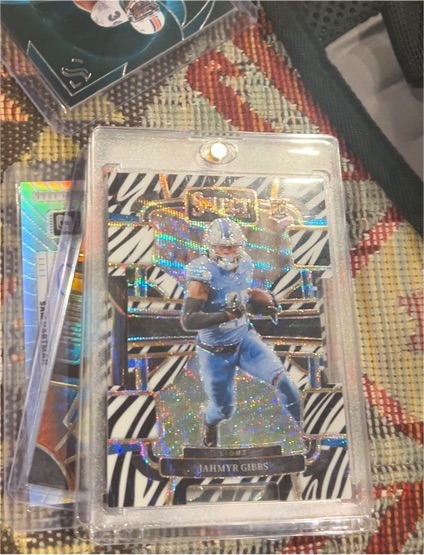 2023 Panini Select Concourse #34 Jahmyr Gibbs Zebra Prizm Die-Cut Rookie — front