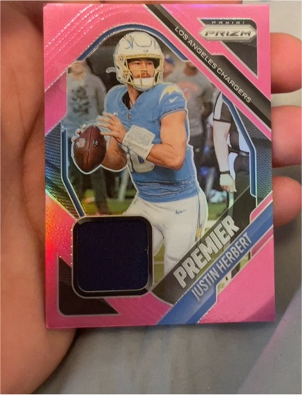 2025 Panini Prizm #PJY-JHT Justin Herbert Premier Jerseys Pink Prizm — front