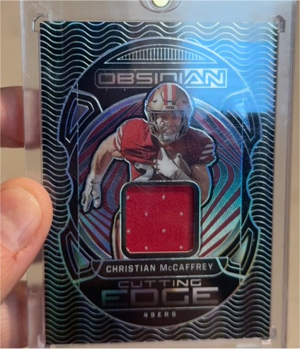2021 Panini Obsidian #CE-CM Christian McCaffrey Cutting Edge — front