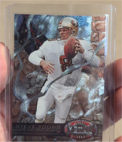 1997 Skybox Metal Universe #27 Steve Young — front