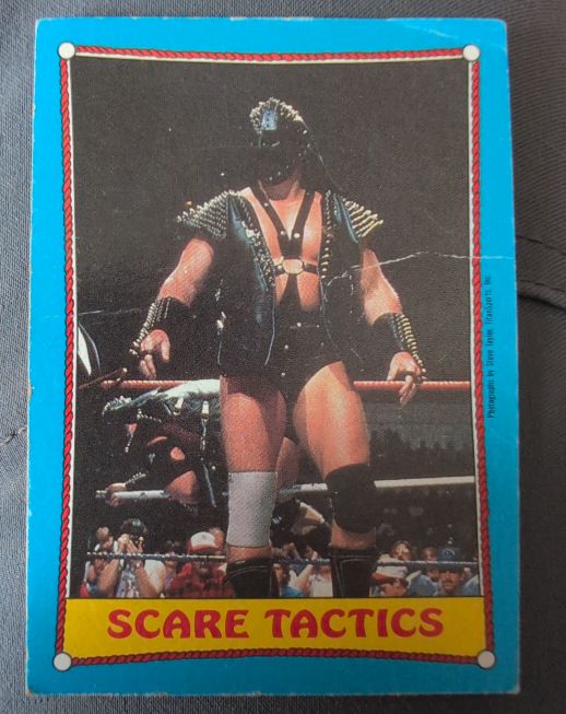 1987 Topps WWF #64 Scare Tactics Demolition — front
