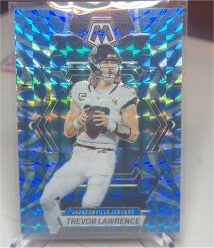 2023 Panini Mosaic #102 Trevor Lawrence Reactive Blue Mosaic Prizm — front