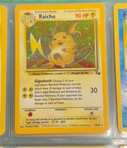 1999 Pokémon Fossil #14/62 Raichu — front