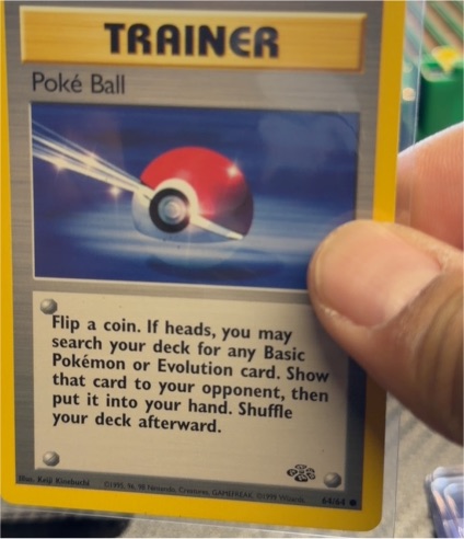 1995 Jungle #64 Poke Ball Trainer — front