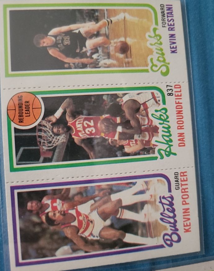 1980-81 Topps Basketball Card #174 Kevin Porter, Dan Roundfield & Kevin Restani — front