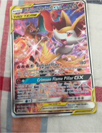 2019 Pokémon TCG Charizard & Braixen GX #SM230 — front