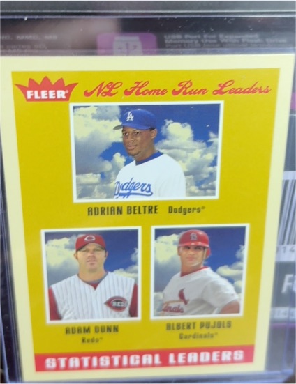 2005 Fleer Tradition #10 Adrian Beltre / Adam Dunn / Albert Pujols — front