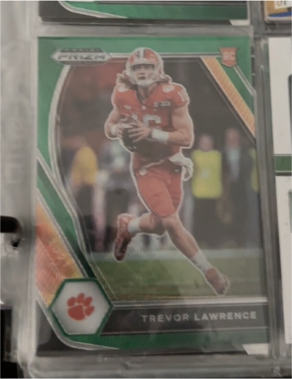 2021 Panini Prizm Draft Picks #106 Trevor Lawrence Green Prizm Rookie Card — front