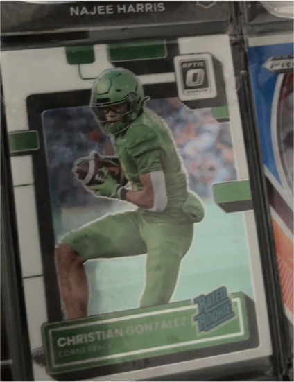 2023 Panini Chronicles Draft Picks - Donruss Optic Rated Rookies #8 Christian Gonzalez — front