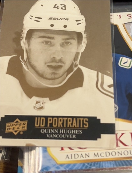 2021-22 Upper Deck UD Portraits #P-1 Quinn Hughes — front