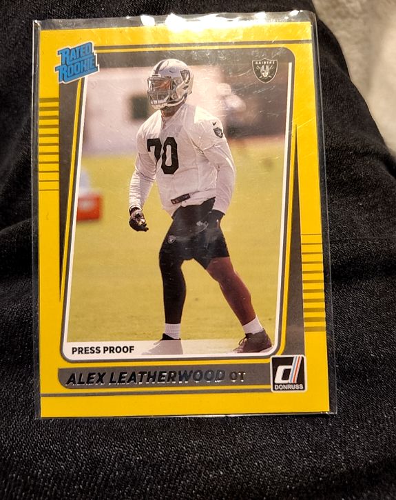 2021 Donruss #335 Alex Leatherwood Press Proof Rookie — front