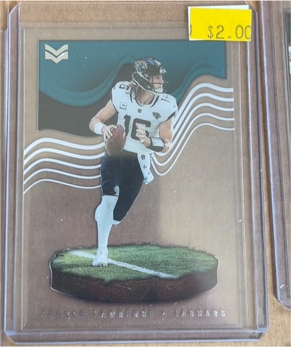 2022 Panini Chronicles Magnitude #MAG-9 Trevor Lawrence — front