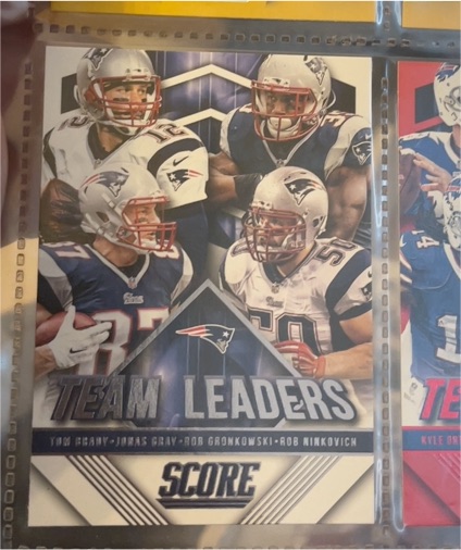 2015 Panini Score #1 Team Leaders Tom Brady, Jonas Gray, Rob Gronkowski, Rob Ninkovich — front