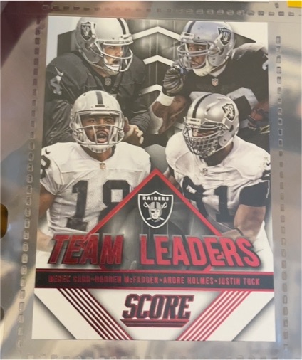 2015 Panini Score Football Team Leaders #28 Derek Carr Darren McFadden Andre Holmes Justin Tuck — front