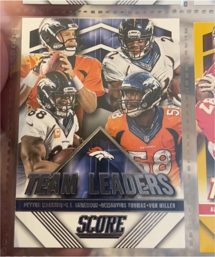 2015 Panini Score #25 Peyton Manning C.J. Anderson Demaryius Thomas Von Miller — front