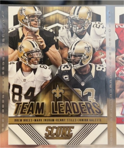 2015 Panini Score #22 Drew Brees Mark Ingram Kenny Stills Junior Galette Team Leaders Gold — front