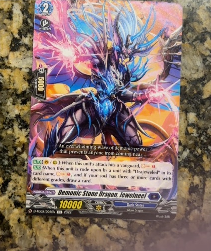 2022 Cardfight!! Vanguard D-1002/002EN Demonic Stone Dragon, Jewelneel — front