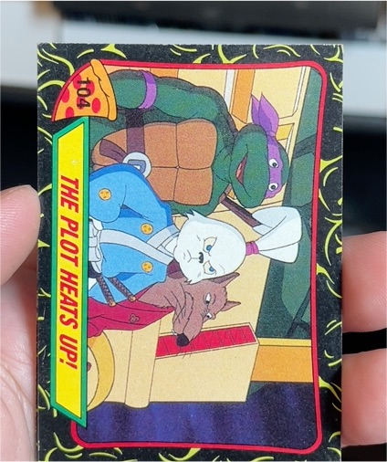1989 Topps Teenage Mutant Ninja Turtles #104 The Plot Heats Up! — front