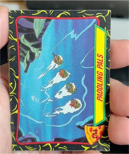 1989 Topps Teenage Mutant Ninja Turtles #141 Paddling Pals — front