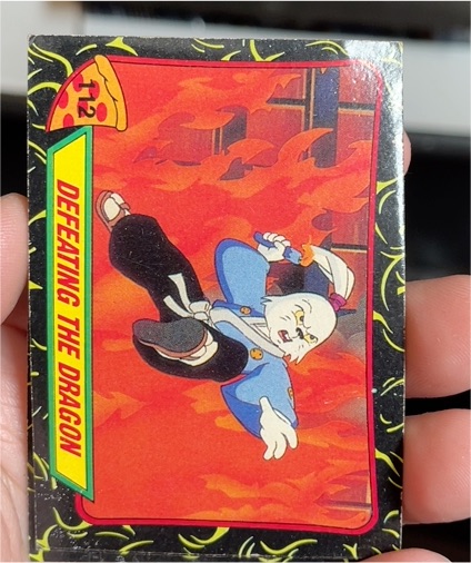 1989 Topps Teenage Mutant Ninja Turtles #112 Defeating the Dragon — front