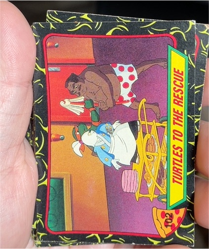 1989 Topps Teenage Mutant Ninja Turtles #102 Turtles to the Rescue — front