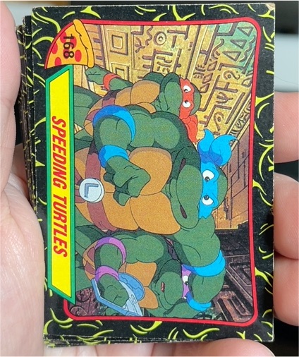 1989 Topps Teenage Mutant Ninja Turtles #168 Speeding Turtles — front