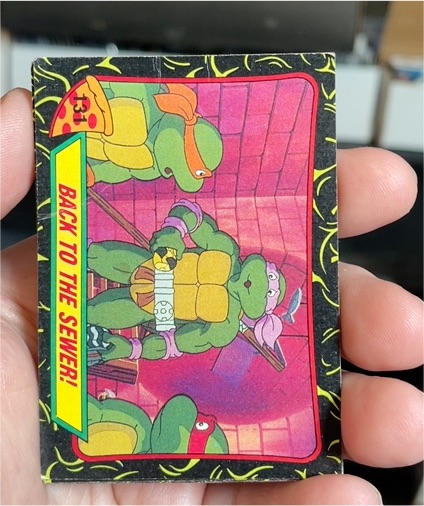 1989 Topps Teenage Mutant Ninja Turtles #131 Back to the Sewer! — front