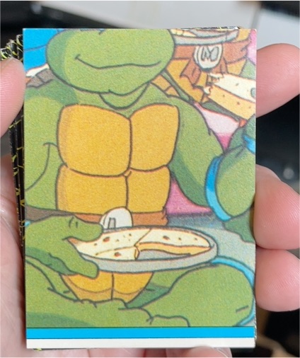 1989 Topps Teenage Mutant Ninja Turtles Sticker #11 Michelangelo — front