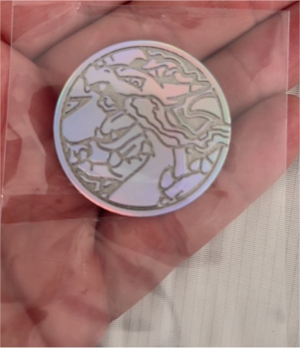 2025 Pokémon Mega Charizard X EX UPC Ultra Premium Collection Metal Coin — front