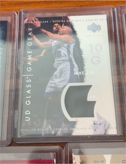 2003-04 Upper Deck Glass #GG-MB Mike Bibby Game Gear — front