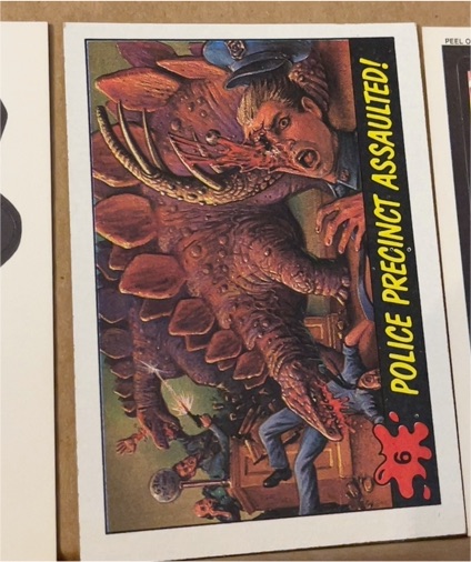 1988 Topps Dinosaurs Attack! #6 Police Precinct Assaulted! — front
