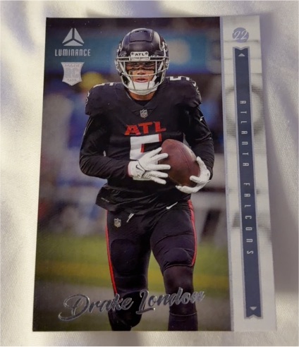2022 Panini Chronicles Luminance #203 Drake London — front