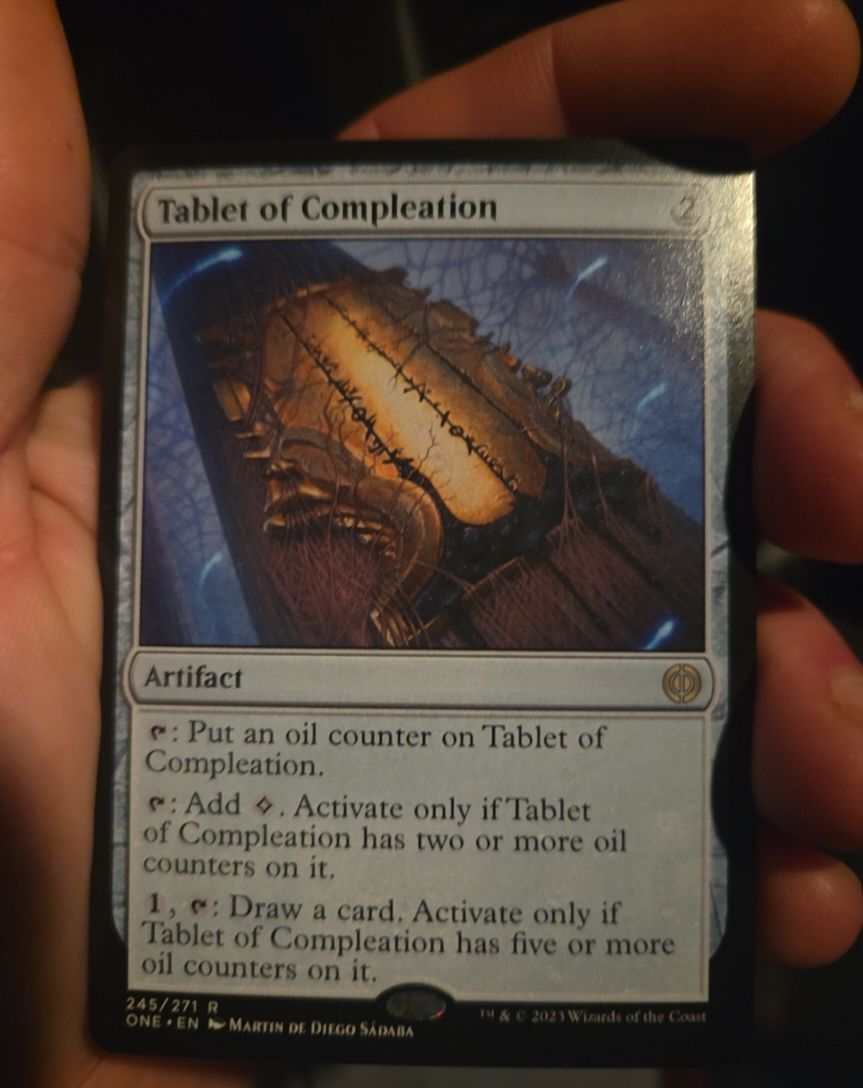 2023 Phyrexia: All Will Be One #245 Tablet of Compleation — front