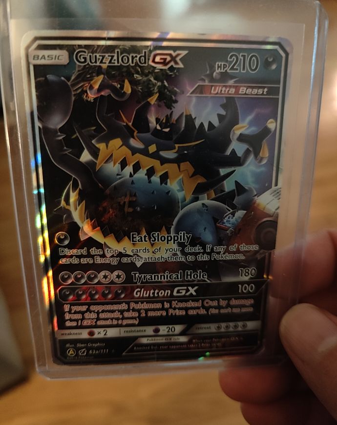 2018 Pokémon SM Crimson Invasion #63a Guzzlord GX — front